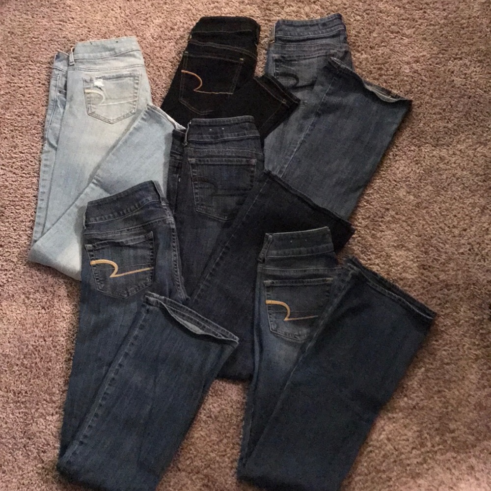 6 pair of American Eagle jeans